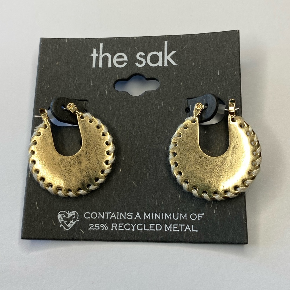 The Sak gold toned round hoop earring with thread detail